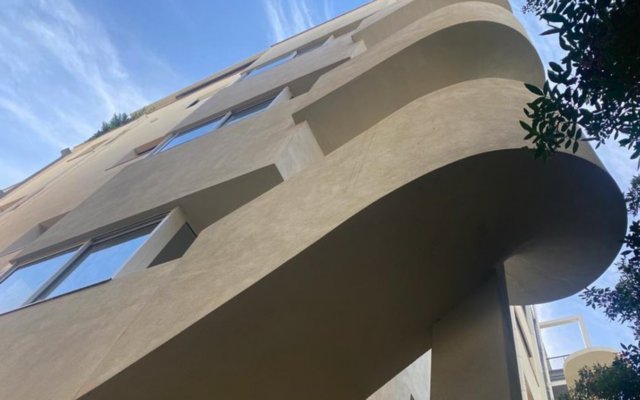 The iconic exterior staircase at 123 Yehuda Halevi Street in Tel Aviv, the historic Bauhaus building that was heavily affected by the Iranian strike on February 28, 2026 (Grasyani House)
